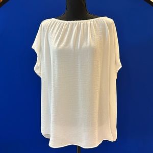 Beautiful sheer cap sleeve tunic with adjustable  neckline